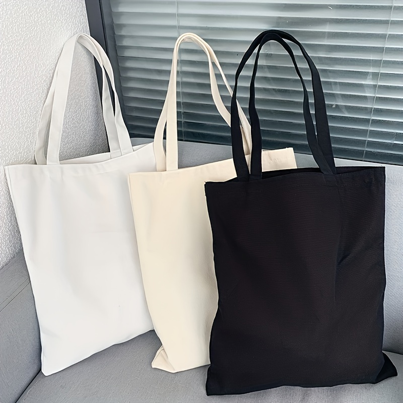 Women Bags Manufacturer - วัสดุผ้าใบสีทึบที่เรียบง่ายและลําลองกระเป๋าสะพายมือถือผู้หญิงความจุขนาดใหญ่สําหรับการช้อปปิ้งและการเดินทาง